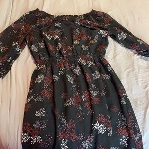 Red, pink, white, flowers on a black dress